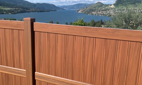 Non-combustible vinyl fence installed along a California home yard